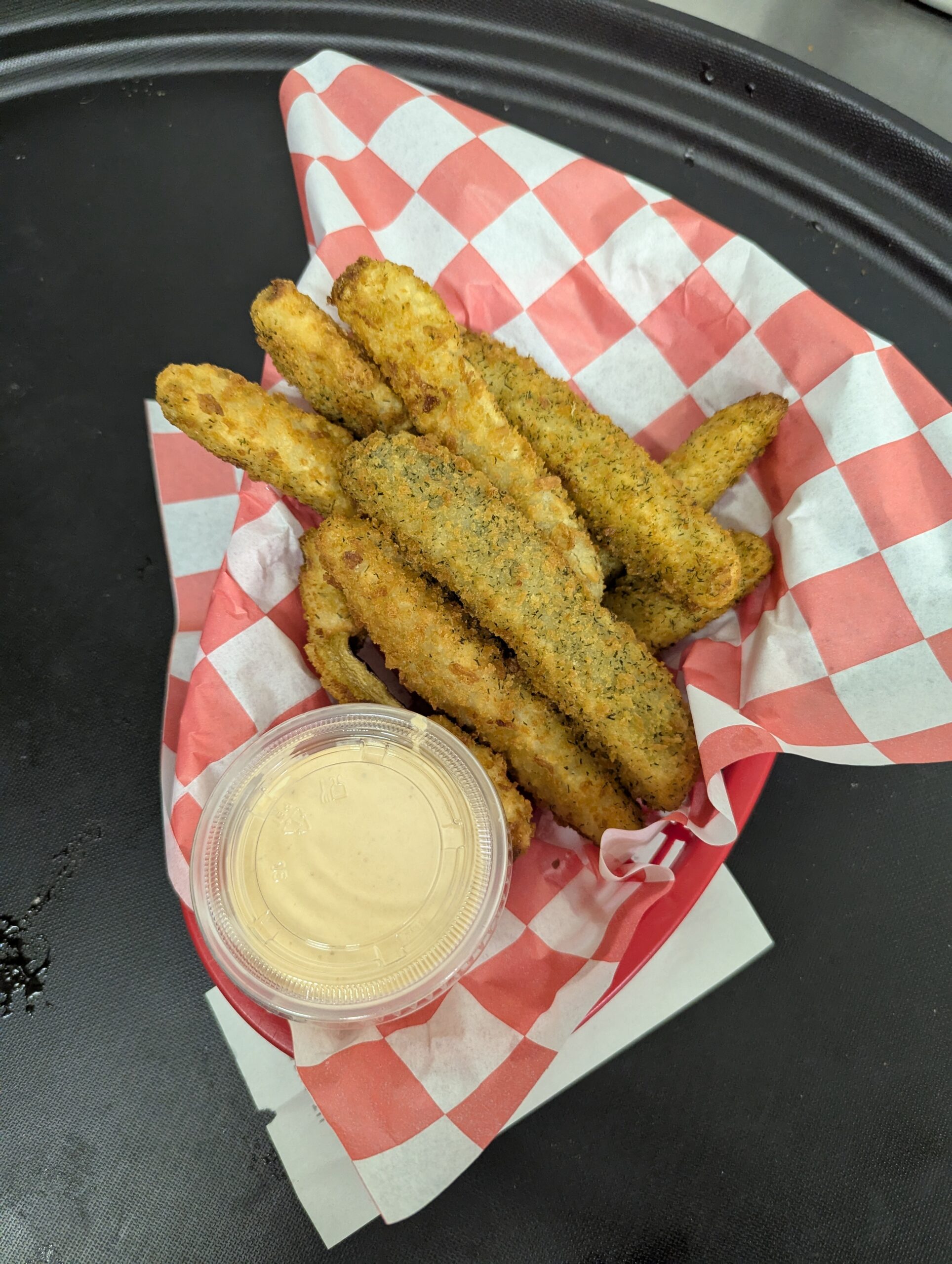 Fried pickle spears with dipping sauce